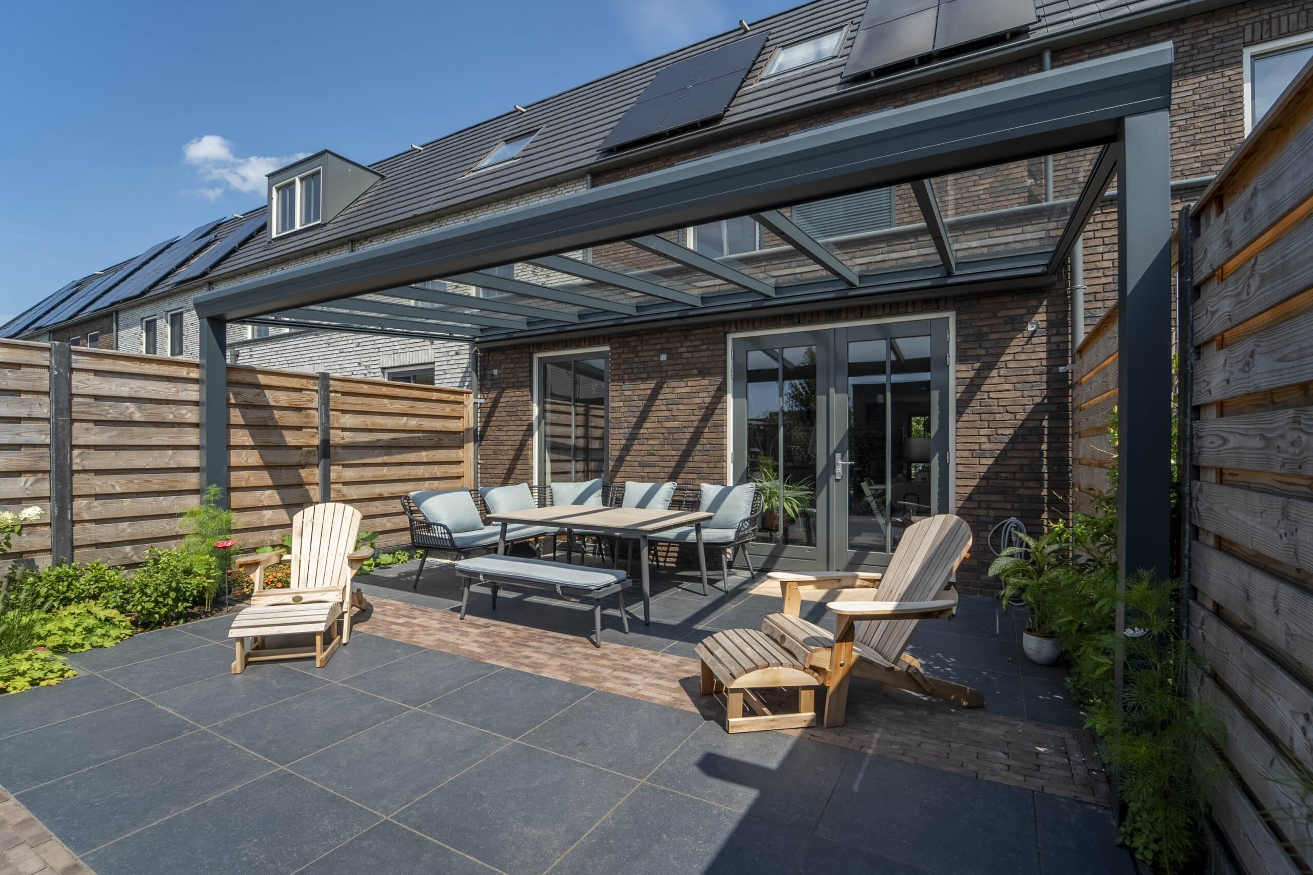 Long veranda with adirondack chairs